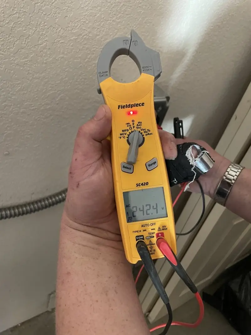 Voltage testing with clamp meter during Generator Installation in Hingham